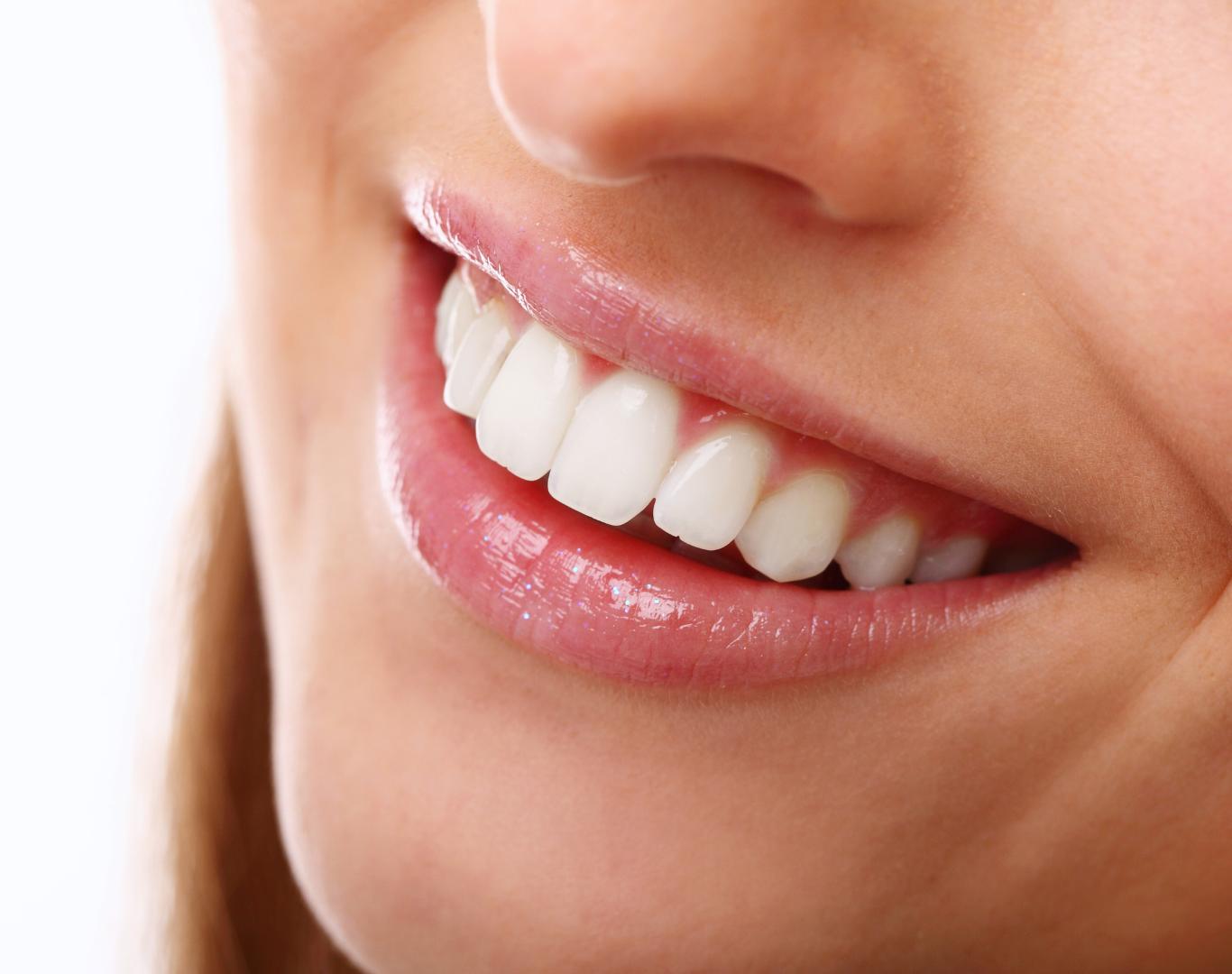 Patient smiling after taking cosmetic dentist in Beamsville, ON